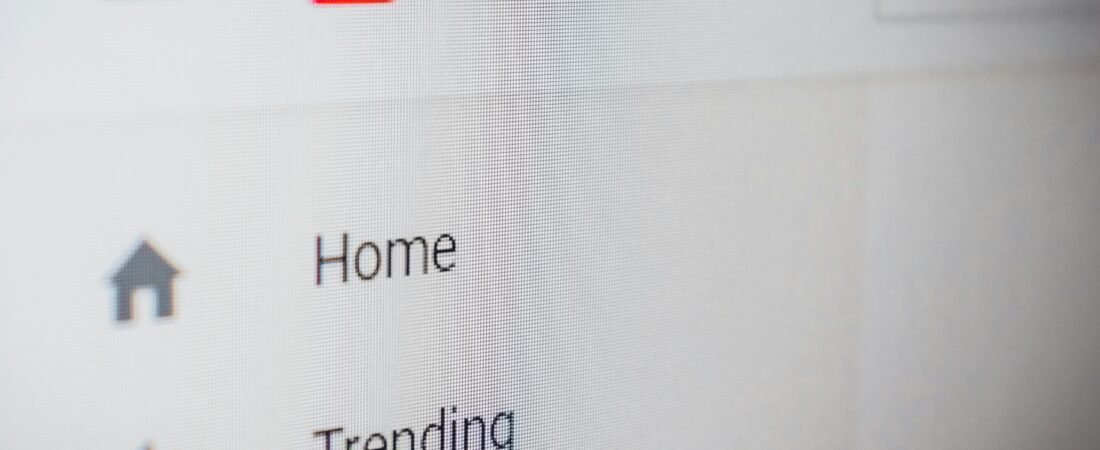 Best YouTube channels to learn Romanian displayed on a smartphone screen